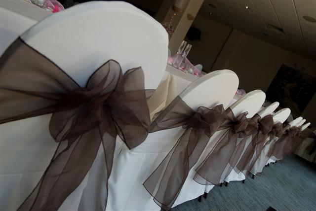 Spend less on food, spend a little more on chair covers, things will be fine!